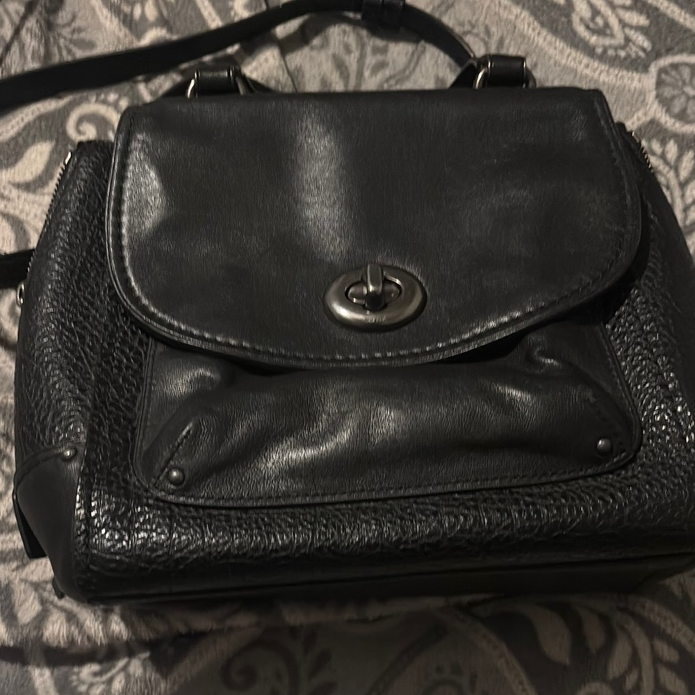 Coach Black Backpacks with Structured Design. Coach pebbled Faye handbag